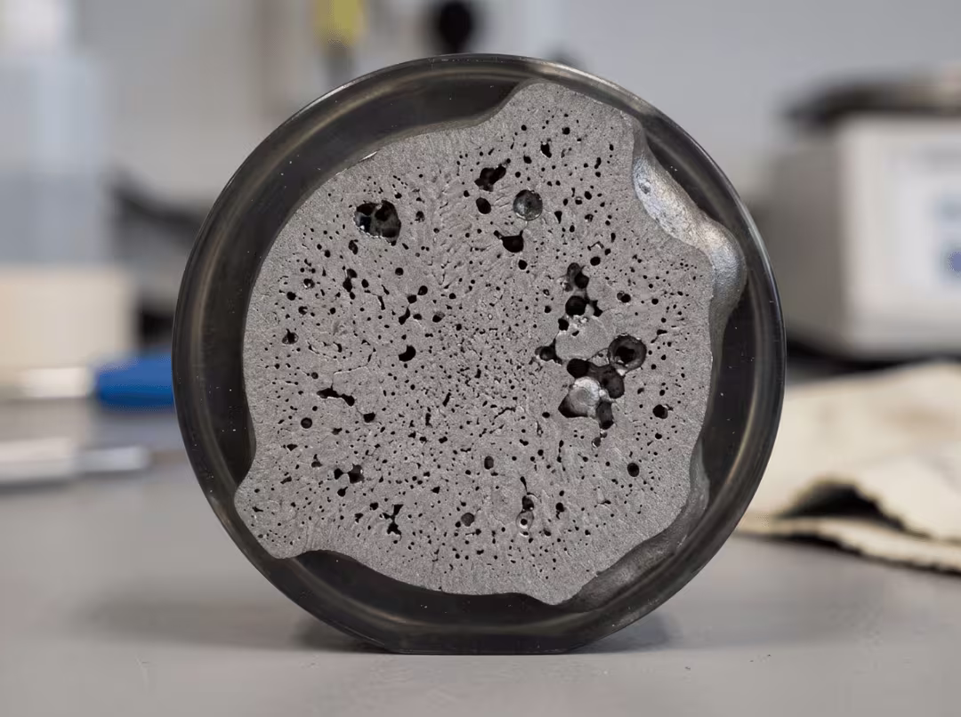 Porosity voids in die cast cross section Porosity voids in die cast cross section