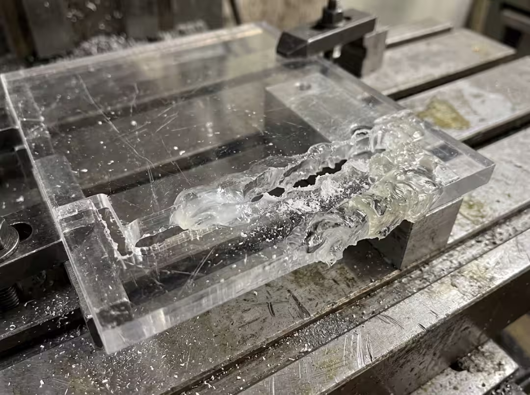 Melted acrylic edge after CNC cutting Melted acrylic edge after CNC cutting